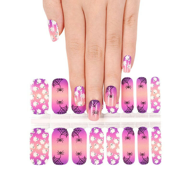 Purple-to-pink ombré nail wraps with ghost and spiderweb Halloween print