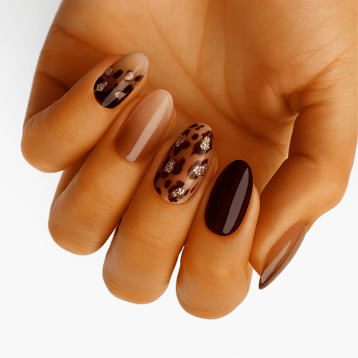 Glossy nail wraps mixing nude, chocolate brown and glittery leopard print accents