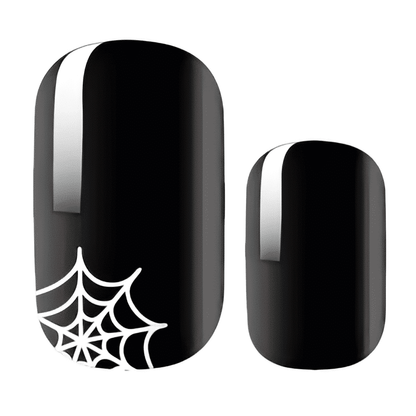 Glossy black nail wraps with metallic silver streak and white spiderweb accent design