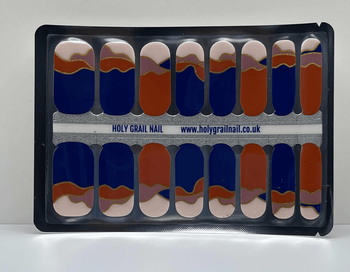 Non-UV nail wraps sheet showing abstract geometric pattern in navy, coral and nude colours