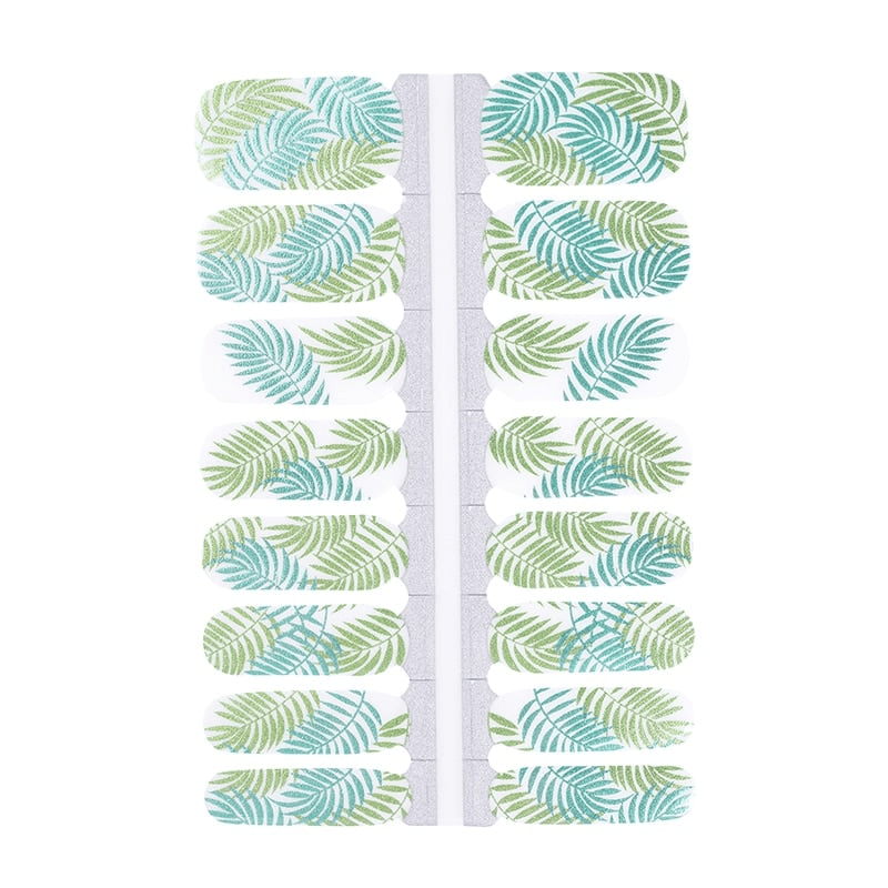 Green tropical fern nail wrap sheet showing botanical leaf pattern designs