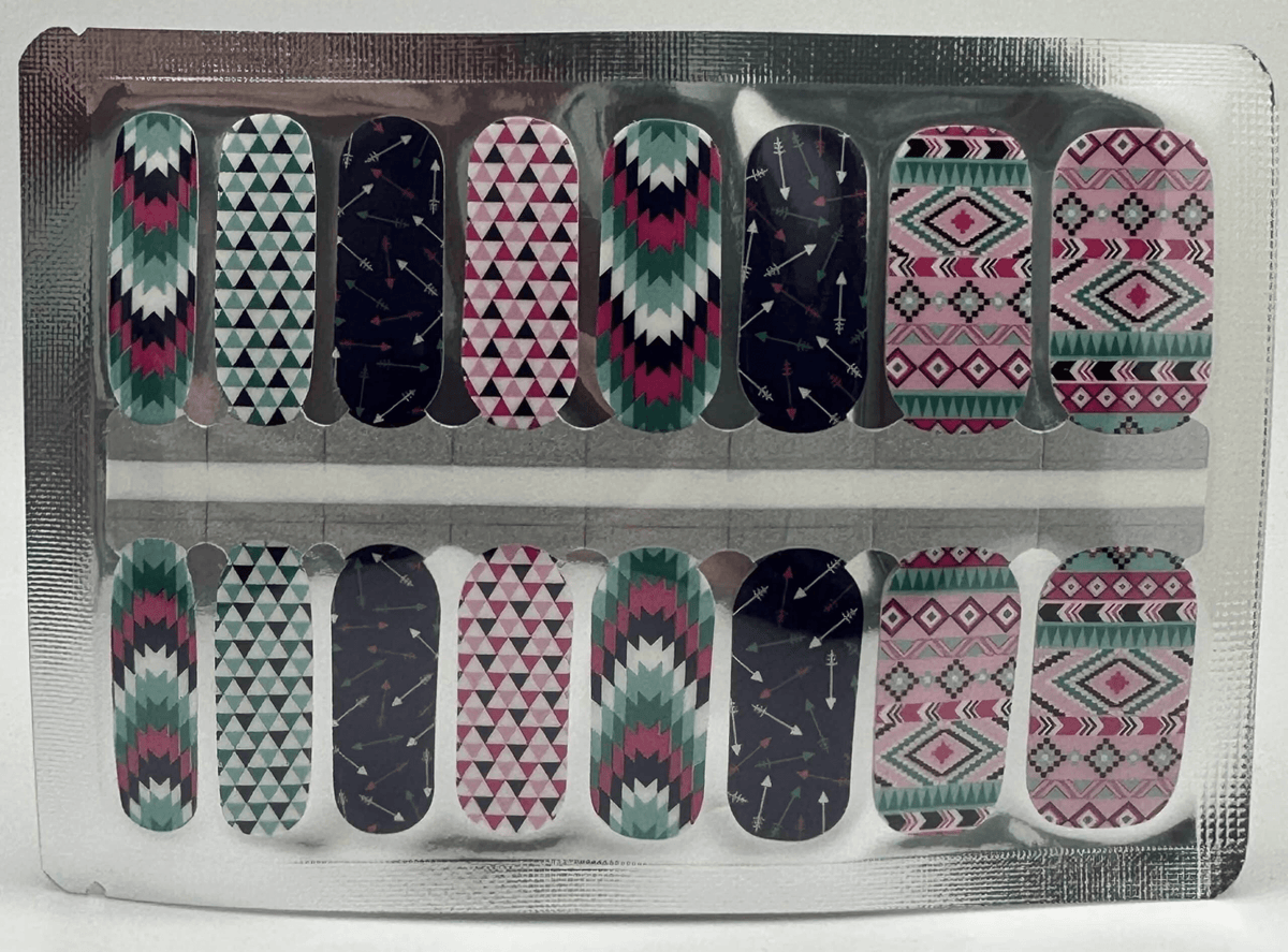 Non-UV nail wraps sheet featuring geometric tribal patterns in navy, pink, turquoise and white