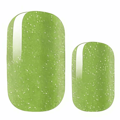 Close-up lime green sparkle nail wraps showing glossy glittery texture finish