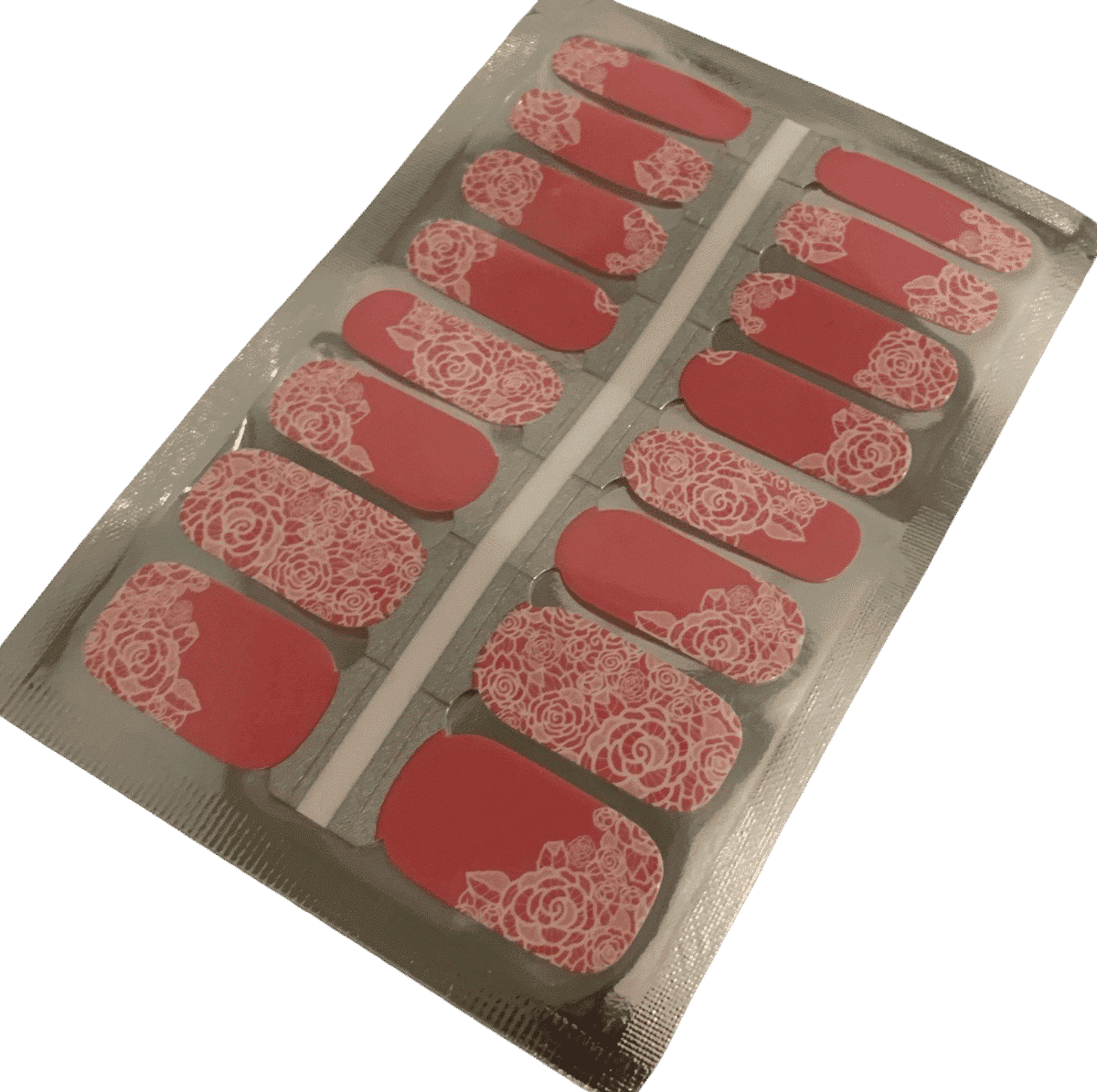 Non-UV nail wraps sheet showing pink base with white lace flower designs