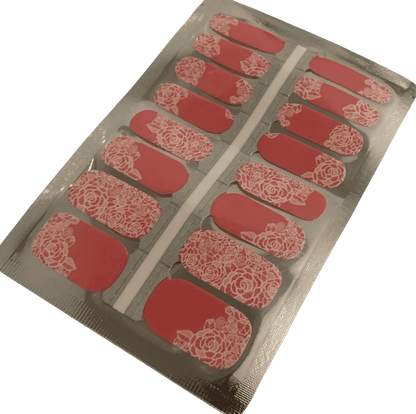 Non-UV nail wraps sheet showing pink base with white lace flower designs