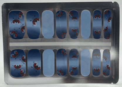 Non-UV nail wraps sheet featuring blue gradient with red ladybird cartoon design for at-home manicure