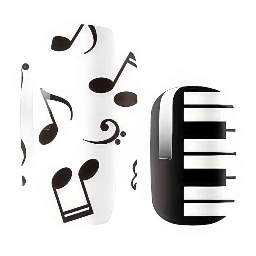 Close up of musical note nail wraps with black piano key design for at-home manicure