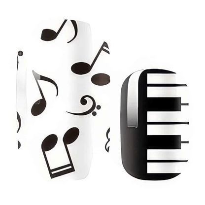 Close up of musical note nail wraps with black piano key design for at-home manicure