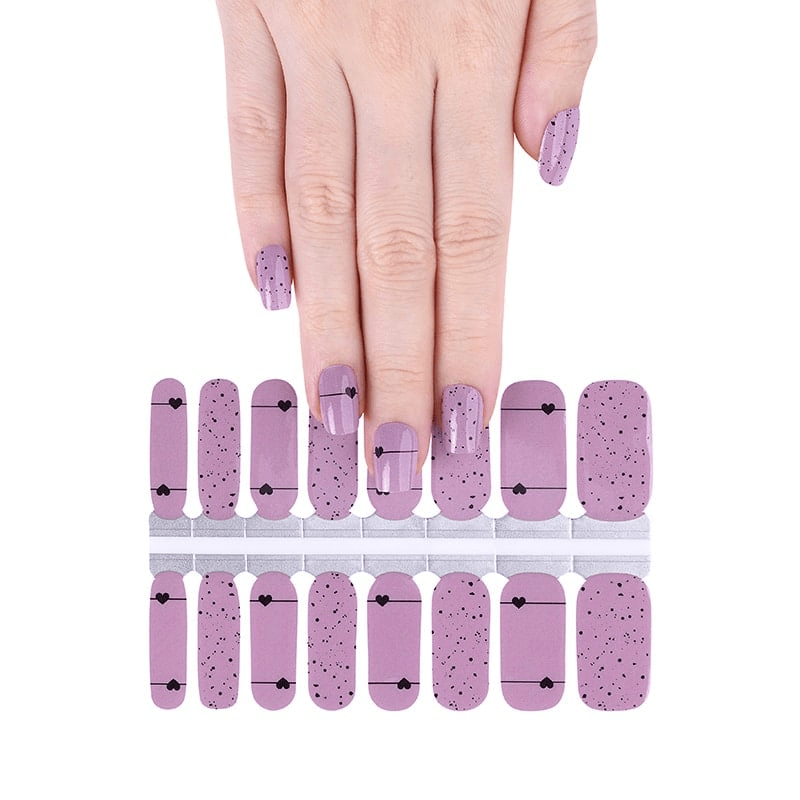 Pink nail wraps sheet with black dots and hearts pattern classic nail art design
