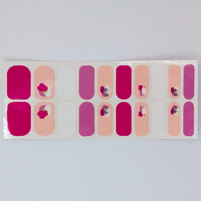 Three sheets of wide fit nail wraps in magenta pink with rose floral patterns