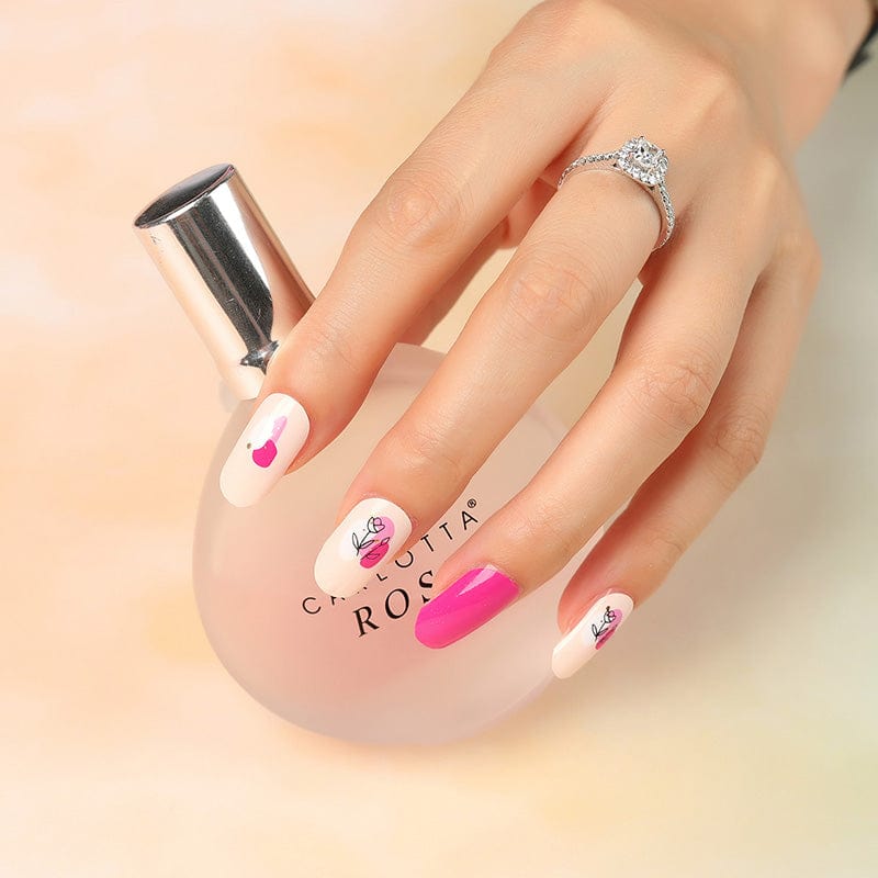 Nude nail wraps with pink rose outline accents and a magenta pop colour nail