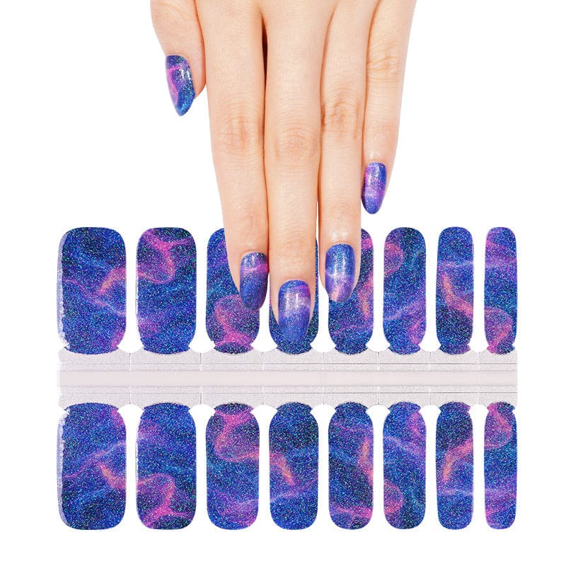 Blue and purple holographic nail wraps with swirling galaxy-like marbled pattern