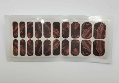 Wide fit nail wraps sheet with abstract marble pattern in orange black burnt tones
