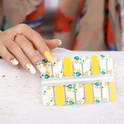 Non-UV nail wraps sheet showing yellow and white floral daisy pattern design