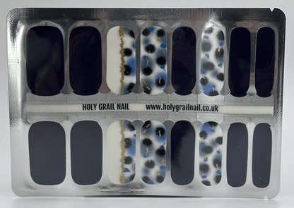 Sheer nail wraps with blue and gold terrazzo pattern in clear packaging sheet