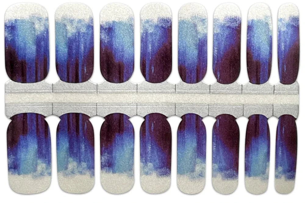 Nail wraps in blue-violet watercolour ombré fading to white tips and base