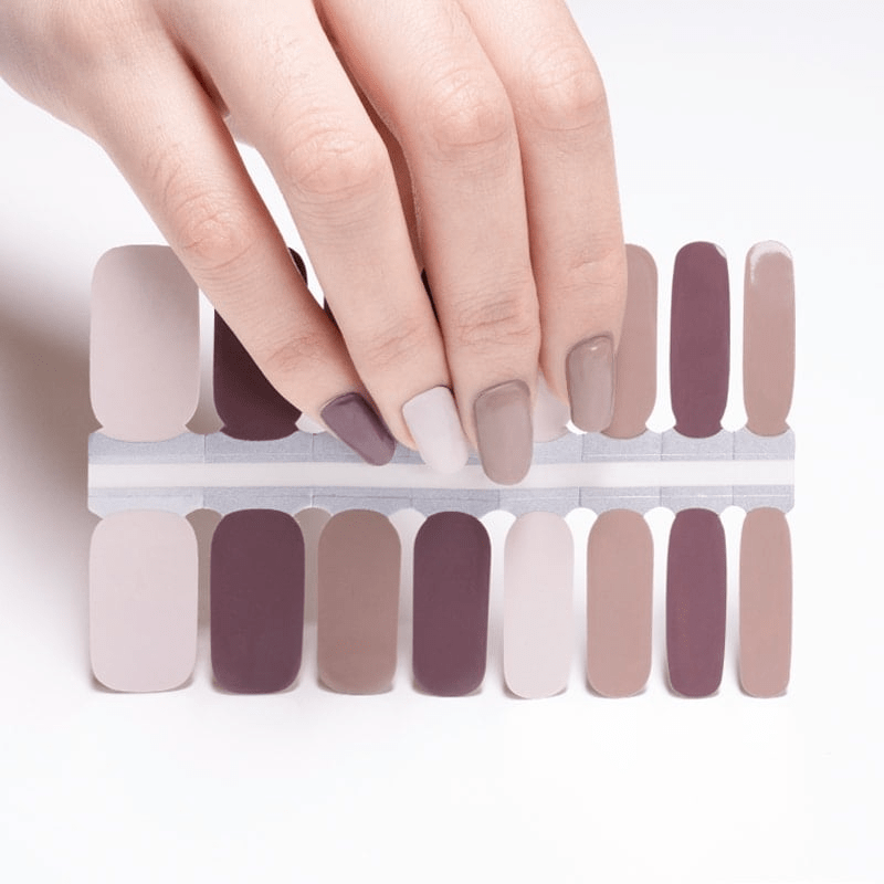 Glossy nail wraps in mixed mauve, taupe and mocha brown solid colours