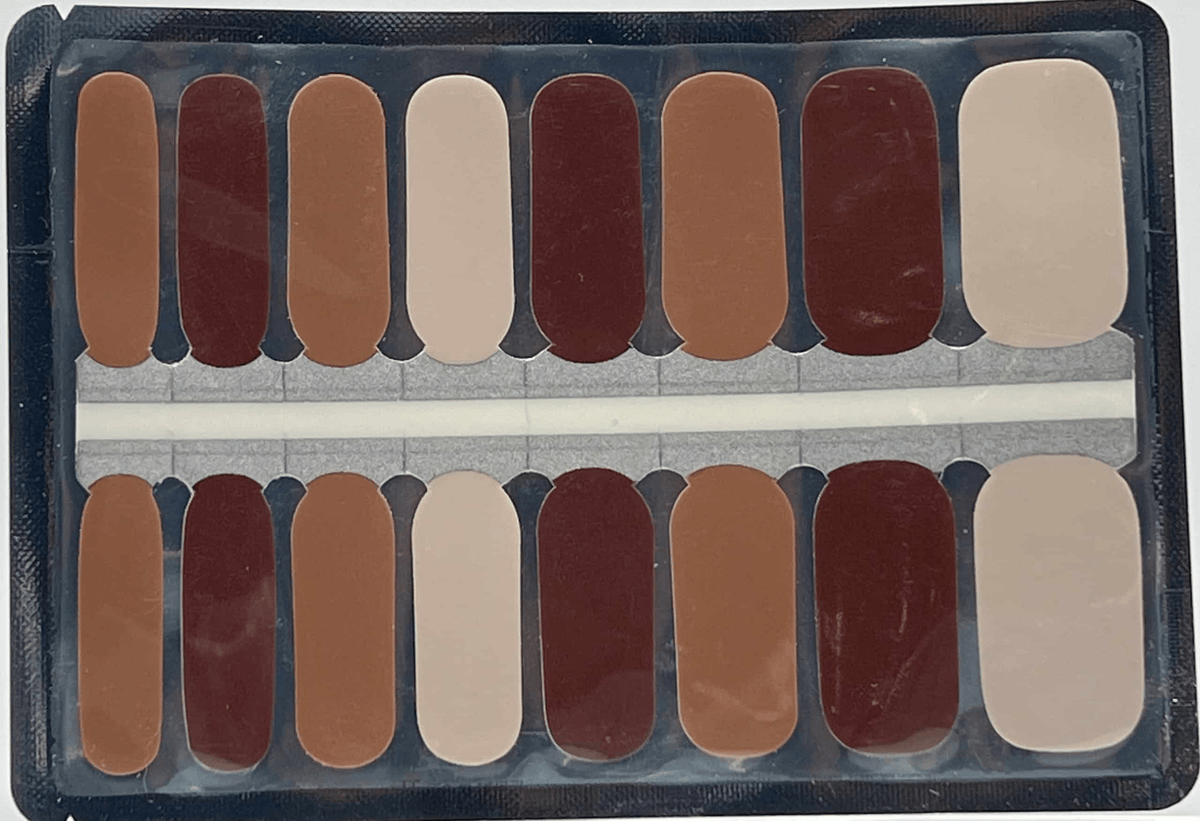Brown mocha nail wrap strips in various coffee shades showing colour range for manicures