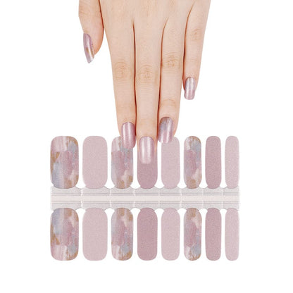 Pink pearl nail wraps sheet showing different sizes for at-home manicure