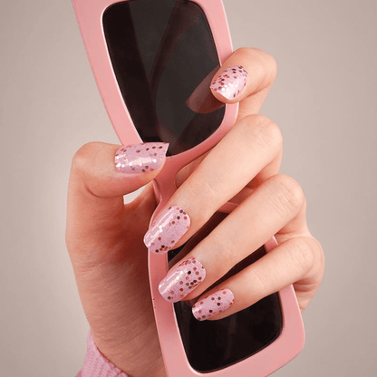 Pink nail wraps with rose gold glitter confetti, glossy finish on short round nails