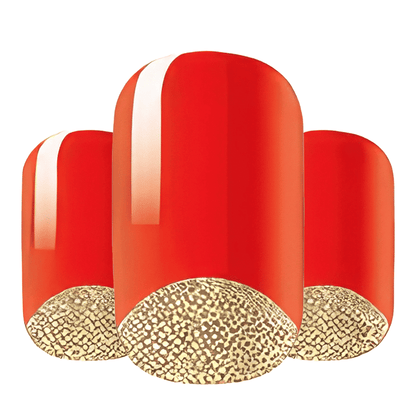 Red nail art wraps with gold textured tips showing reverse French manicure design