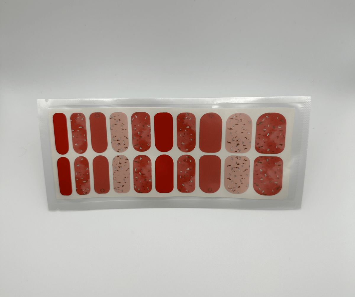 Red marble nail wraps sheet showing 20 pieces in packaging for at-home manicure