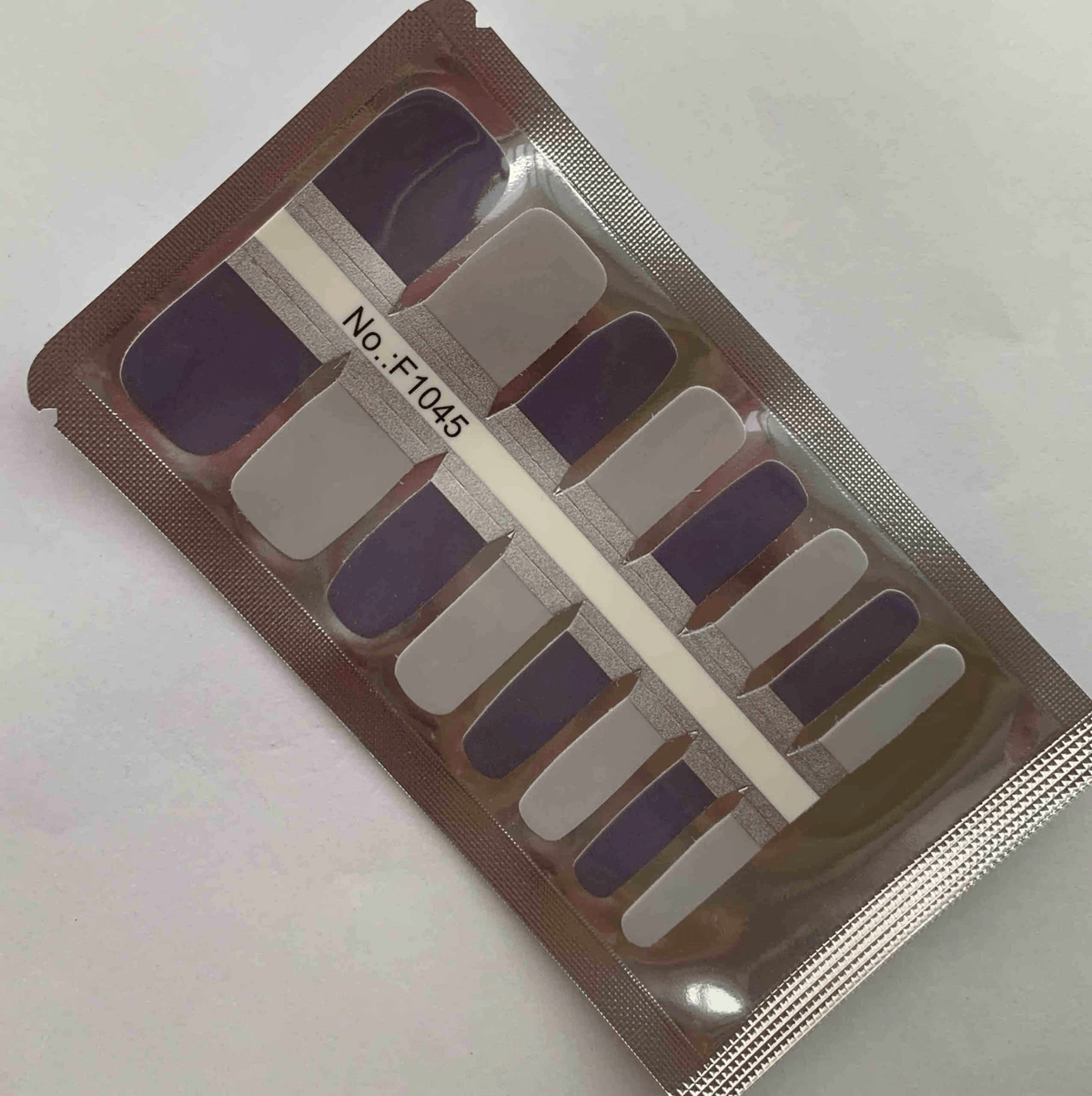 Grey pebble non-UV nail wraps packaging showing pedicure wrap strips for DIY manicure