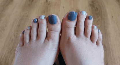 Grey pebble pedicure nail wraps on toes showing elegant matte finish at-home pedicure