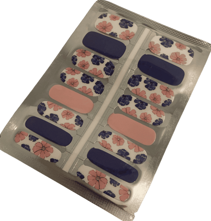 Non-UV nail wraps sheet featuring pink peony and navy floral patterns for at-home manicure