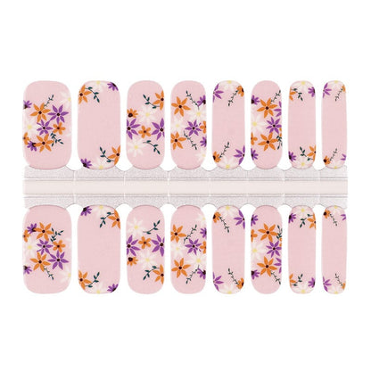Non-UV nail wraps sheet featuring pink base with purple and orange pansy flower design