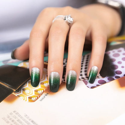 Holy Classics nail wraps, silver glitter ombre fading into deep emerald green, glossy finish