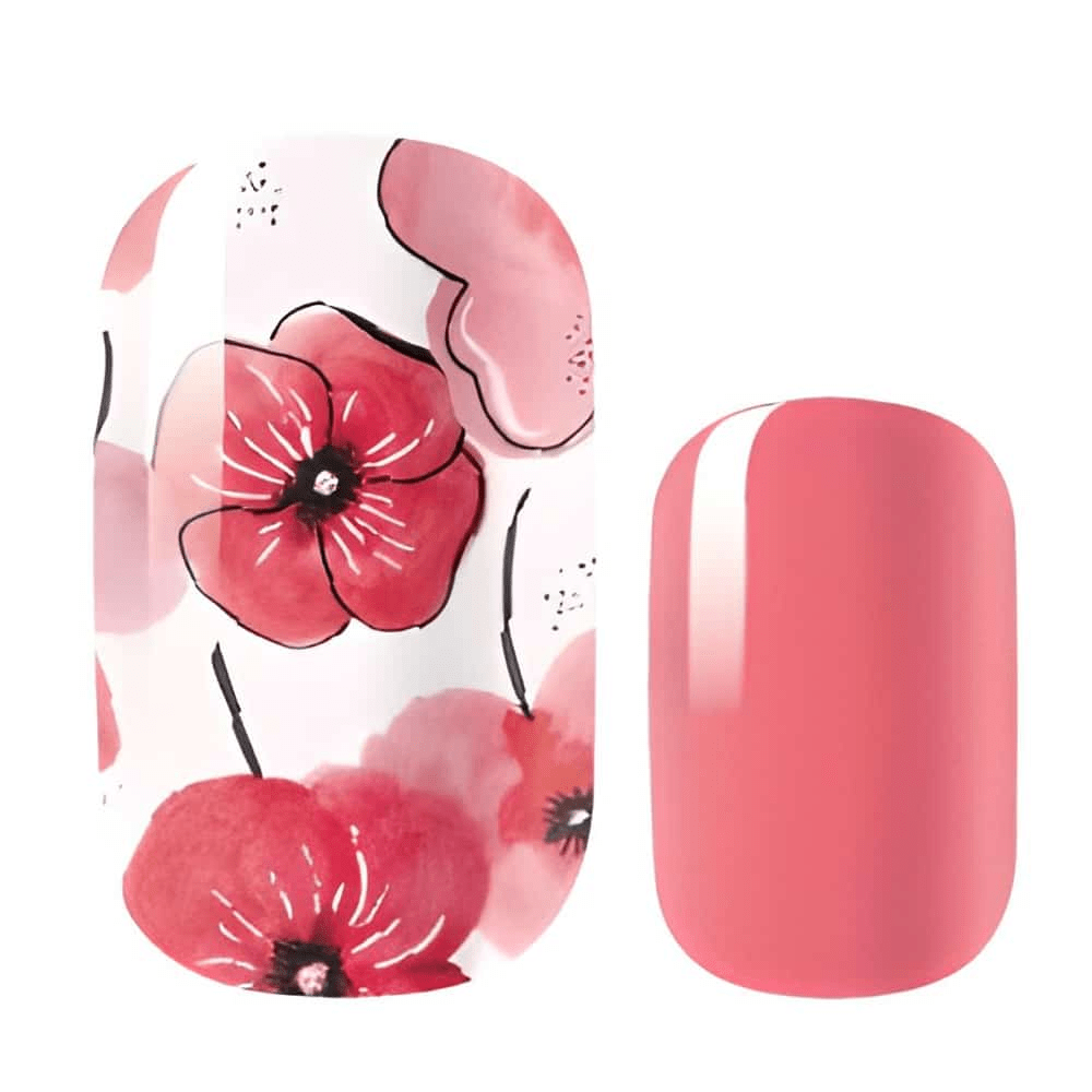 Pink watercolour poppy nail wraps with coral solid colour design close-up