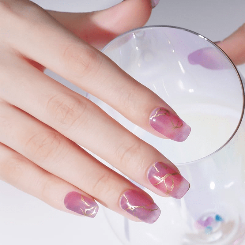 Pink marble nail wraps with gold foil crackle veining, glossy finish, square shape