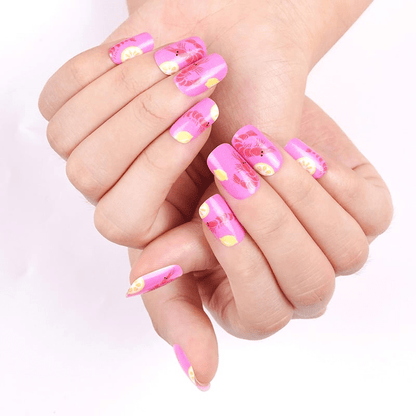 Pink prawn pattern nail wraps on hands showing seafood nail art design