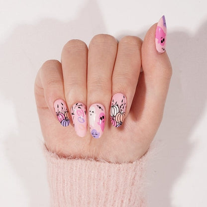 Pink nail wraps with cute ghost faces and pastel pumpkin outlines, glossy finish