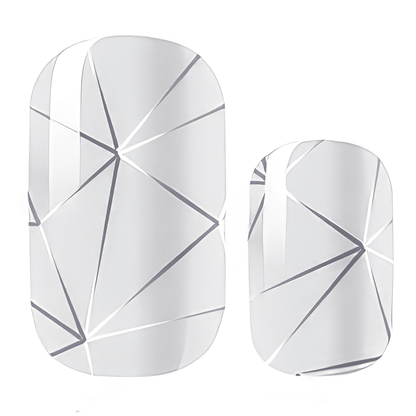 Silver geometric nail wraps with chrome mirror finish and angular pattern design