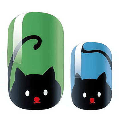 Close-up of kawaii cat nail wrap design in green and blue colours with black cat silhouettes