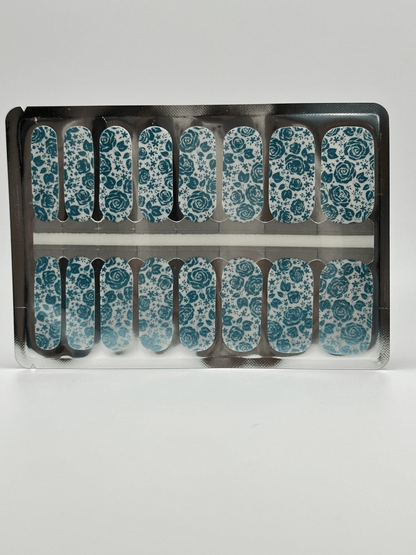 Non-UV nail wraps sheet with teal blue metallic rose floral patterns for at-home manicure