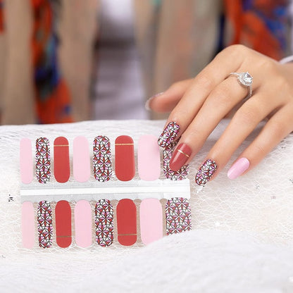 Non-UV nail wraps sheet showing red and pink shades with intricate floral geometric designs