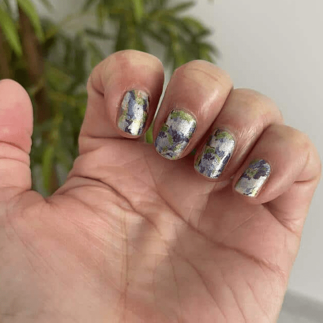 Silver-based nail wraps with purple and green floral foil pattern
