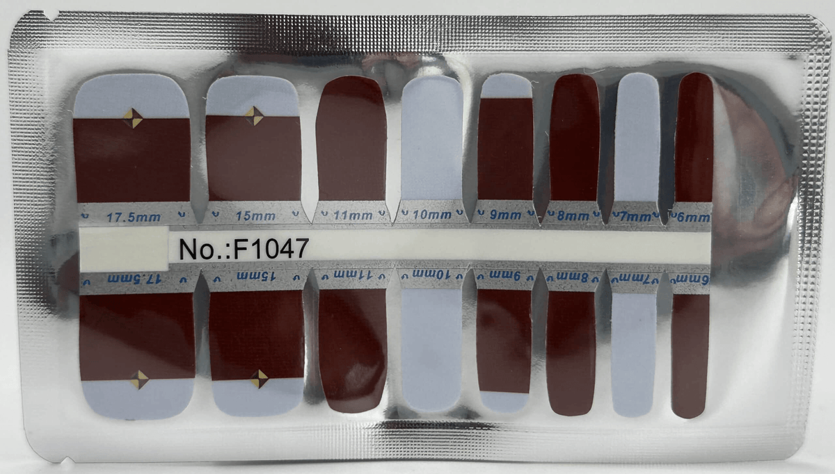 Pedicure nail wraps sheet showing grey and burgundy colour block geometric pattern designs