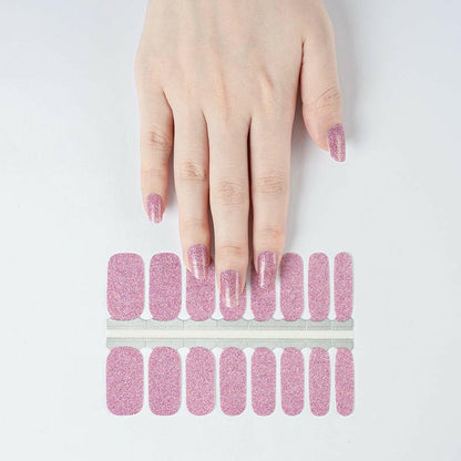Pink glitter nail wraps with sparkling finish, shown on sheet and applied to hand