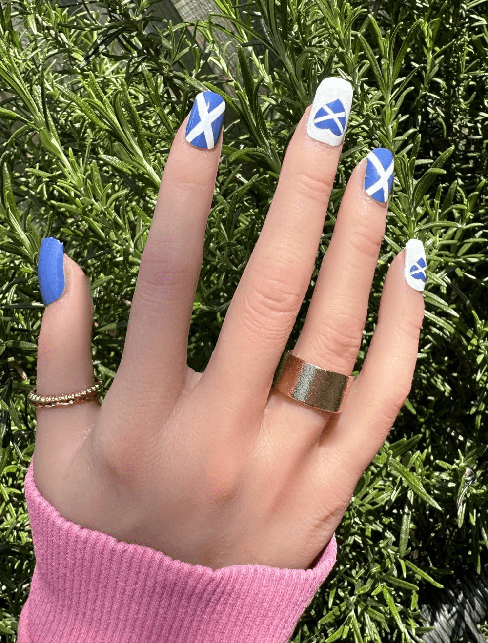 Scottish saltire flag nail wraps blue white patriotic design on hand with gold ring
