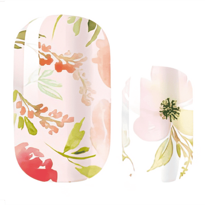 Pink nail wraps with watercolour floral print in coral, red and green botanical tones.