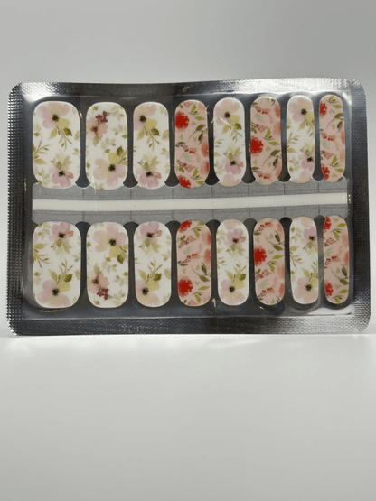 Non-UV nail wraps set showing delicate floral pattern with pink blooms and botanical motifs