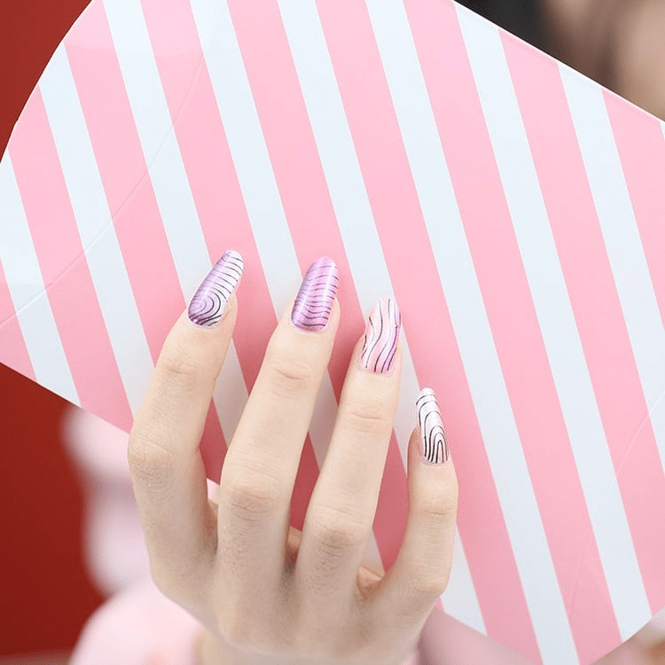 Sheer lilac and pink nail wraps with black abstract swirl line art, almond shape