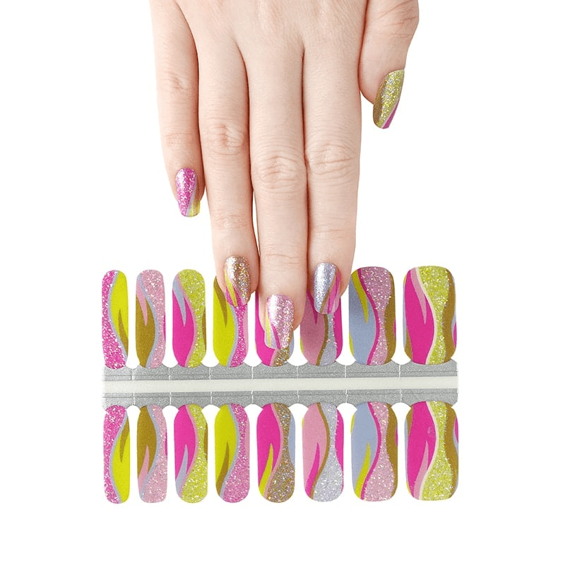 Hands displaying vibrant non-UV nail wraps with pink yellow glitter stripe patterns