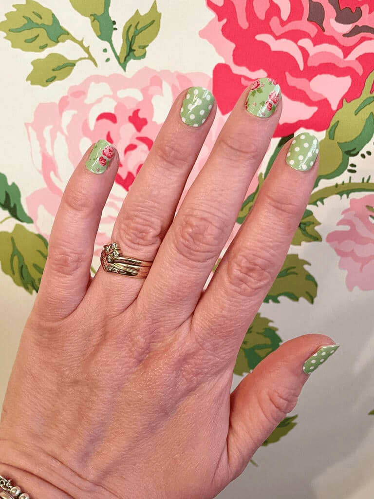 Sage green nail wraps with mixed polka dot and pink rose floral designs