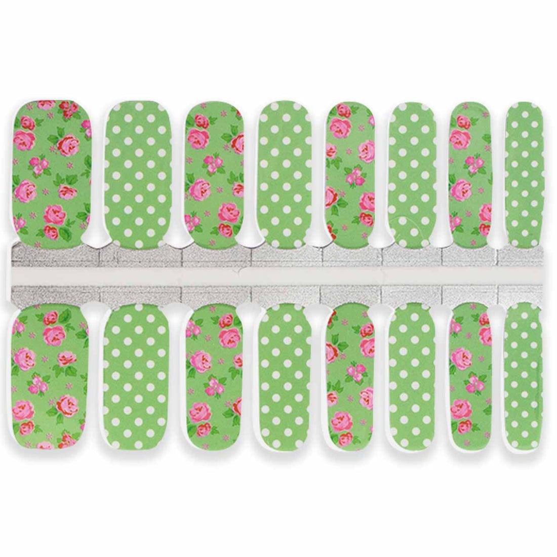 Green nail wraps with pink roses and white polka dots for at-home manicure