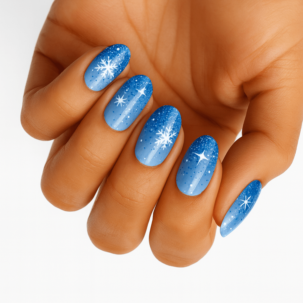 Blue ombre glitter nail wraps with white snowflake and star design